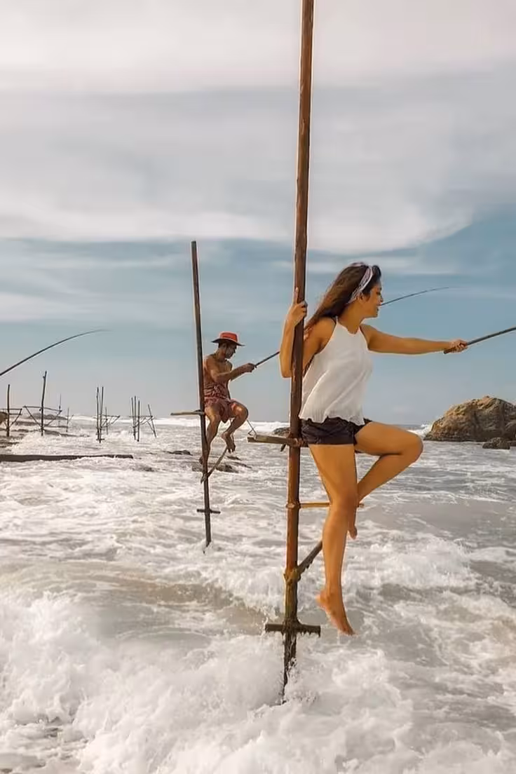 Traditional stilt fishing in Sri Lanka